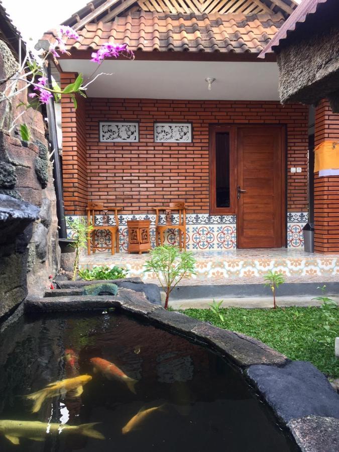 Raditya Homestay Mambal ภายนอก รูปภาพ