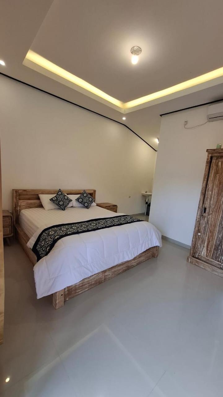Raditya Homestay Mambal ภายนอก รูปภาพ